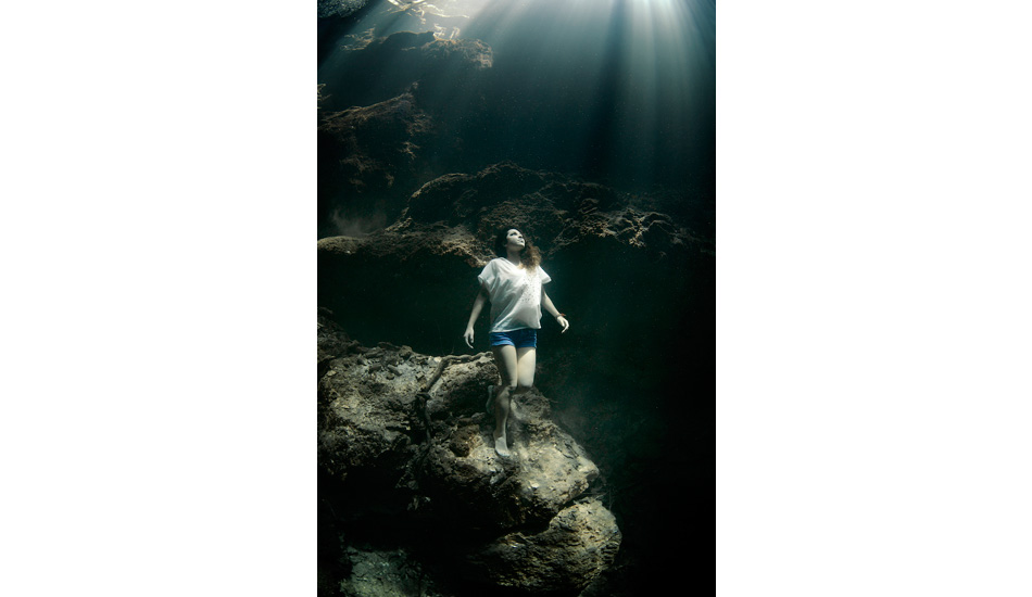 Camila Jaber walking down the cliffs of The Pit. Photo: <a href=\"http://liabarrettphotography.com/\" target=_blank>Lia Barrett</a>