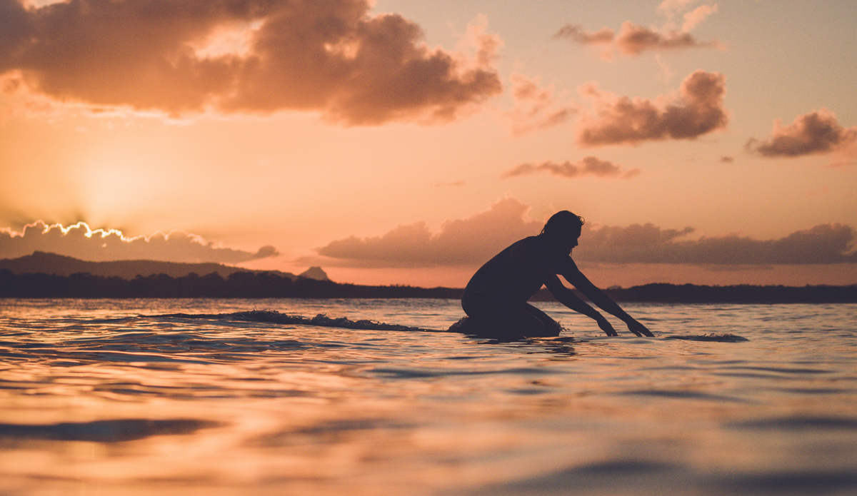 Pat Saunders’ (@pat.saunders) silhouette during a classic evening summer surf in Noosa Heads. Photo: <a href=\"https://instagram.com/thomaslodin\">@thomaslodin</a>