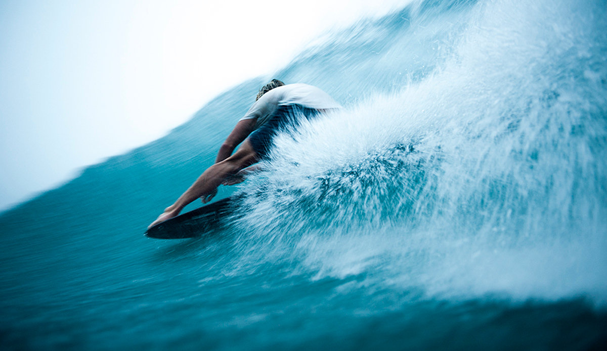 Harrison Roach with full throttle down the Javanese highway. Photo: <a href=\"http://woodygooch.com\">WoodyGooch.com</a>