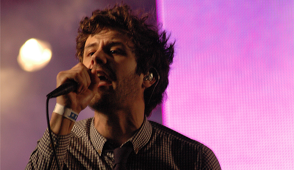 Singer Michael Angelakos of Passion Pit shows off his incredible vocal range and his band’s ability to turn a mud pit into a raging dance party.