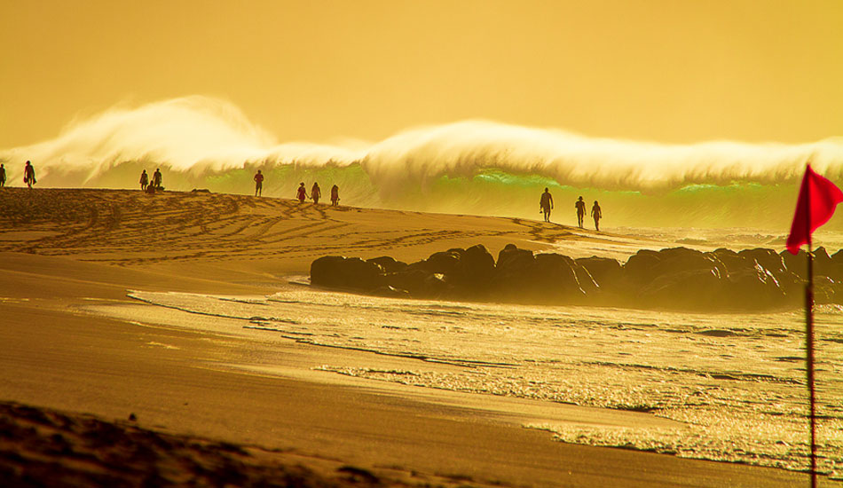 This is one of my favorites yet. Keiki beach break so big it\'s dwarfing everyone on the beach. I’d say 20 foot faces. Some Hawaiians would probably say ten though. Photo: <a href=\"http://500px.com/DougFalterPhotography\">Doug Falter</a>