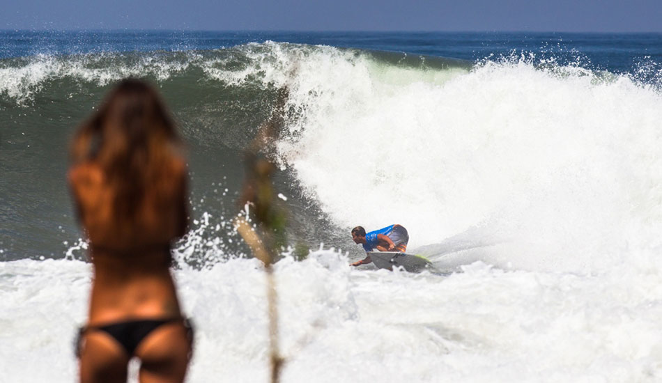 Julian in the background. Pretty girls in the foreground. Sounds about right. Photo: Mick Curley