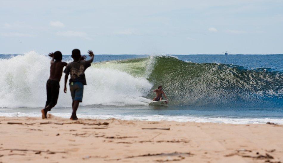 One of the coolest moments I have ever witnessed… the local African kids were so amped on watching Shayne McIntyre surf that they were chasing him down the point each wave; I’m not sure who was more stoked, Shayne or the kids. Photo: Brody/<a href=\"http://www.surfresource.org/\" target=_blank>SurfResource.org</a>