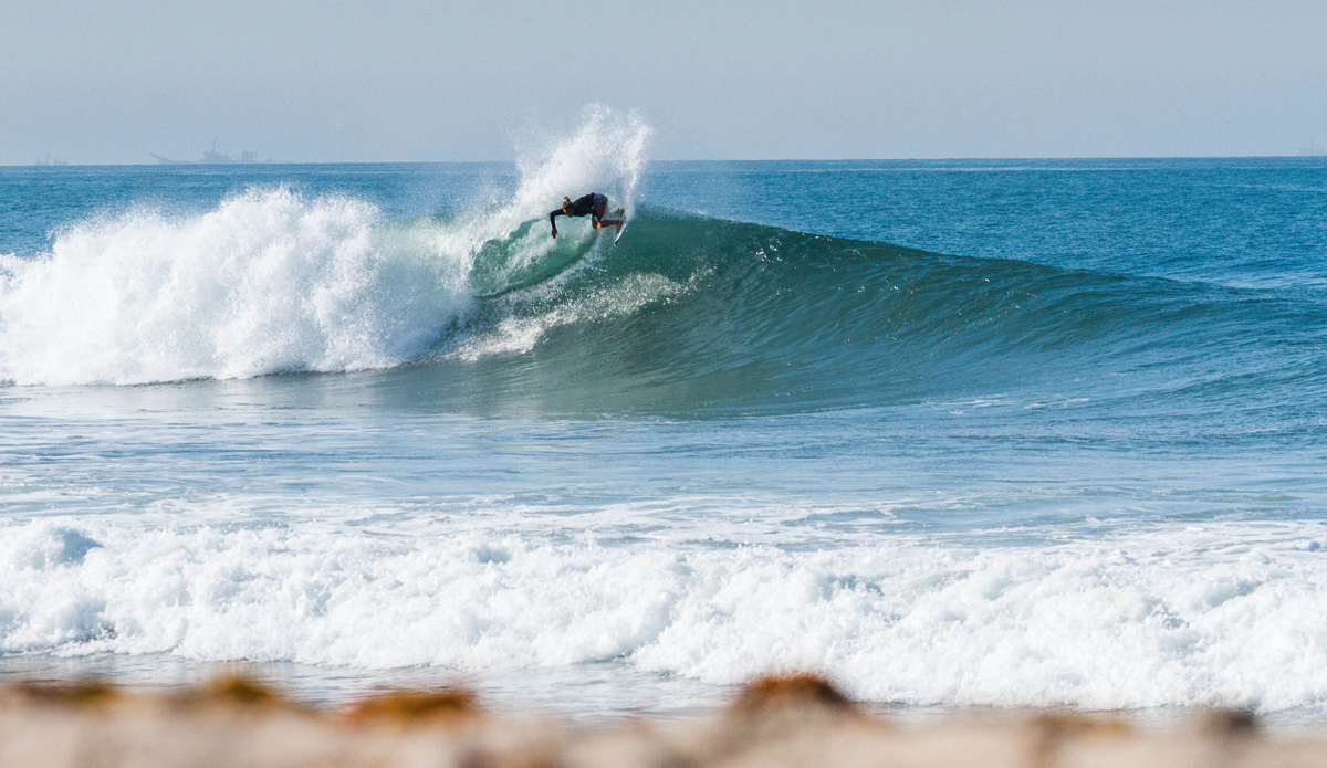 Coco Ho surfing as if she needs to enter the Men’s event. Photo: <a href=\"http://www.rookemedia.com\">Tyler Rooke</a>