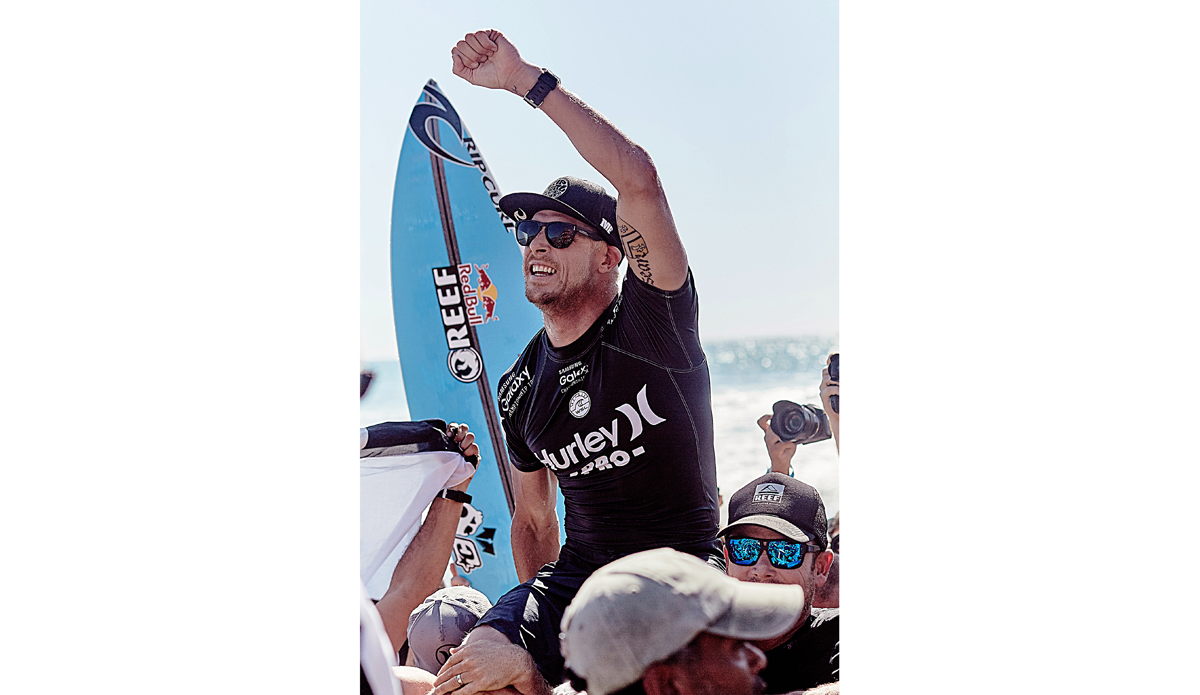 Hurley Pro champ, Mick Fanning, hoisted and carried to the winner\'s podium. Photo: <a href=\"http://santiagobisso.com\">Santiago Bisso</a>