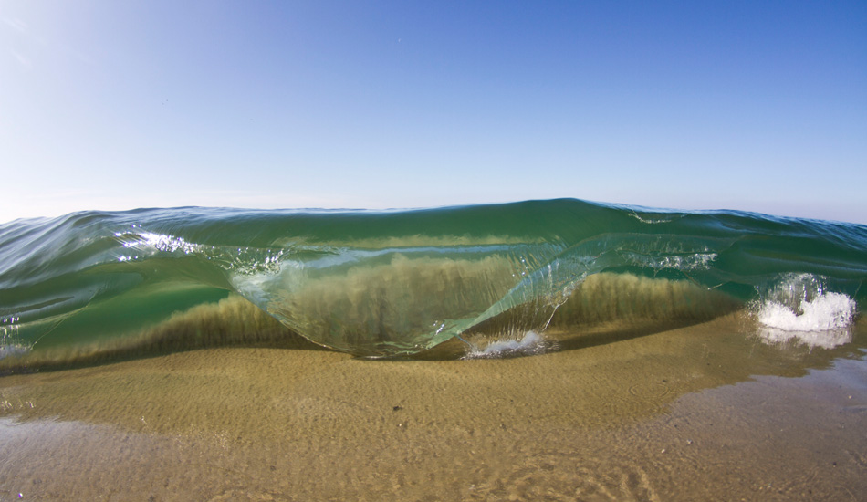 I\'ve never seen sand suck through a lip so I was super stoked to have captured this rare moment. Photo: Luke Forgay