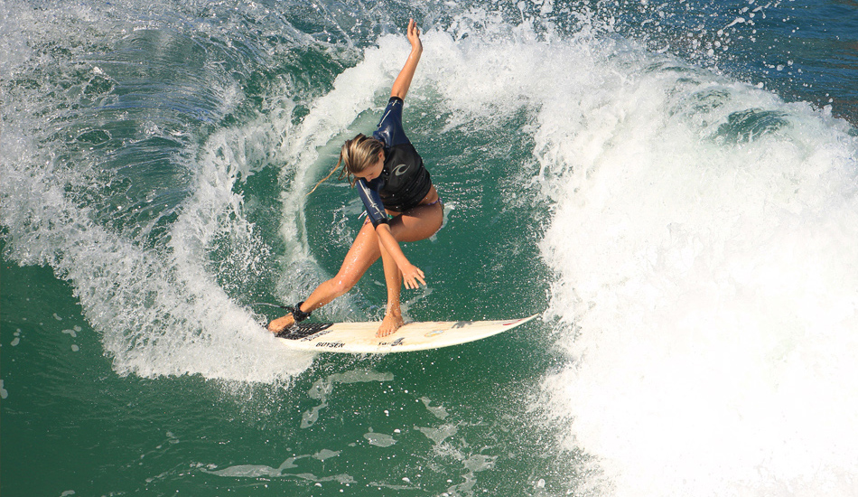 And yes, she can surf better than you. Photo: <a href=\"http://www.mikecoots.com\">Mike Coots</a>