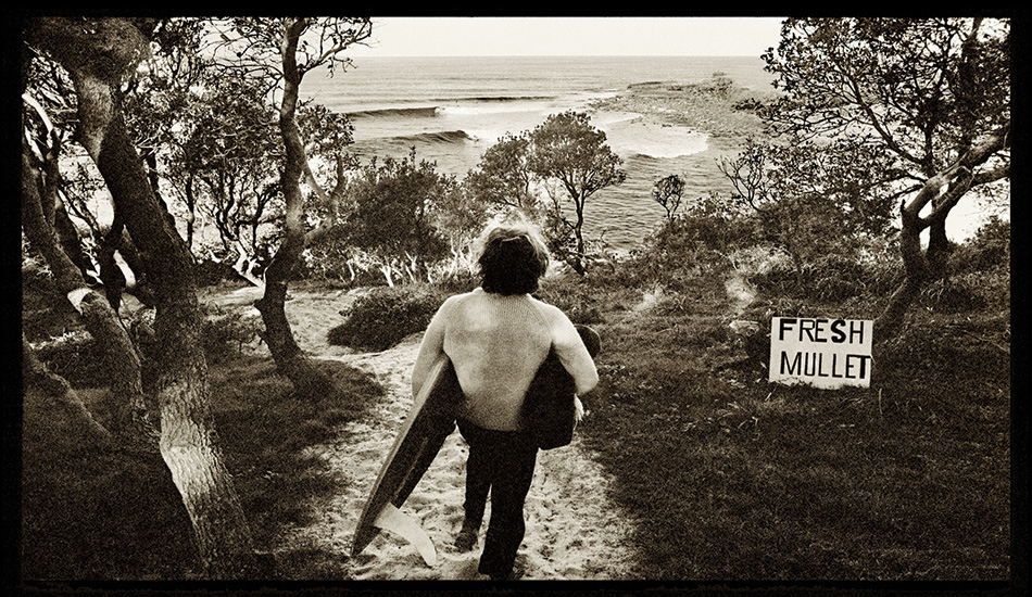 If there’s one picture that captures, for me, the romance of surfing on the north coast of NSW in the early 1970s, then it’s this one. The track down to the surf went straight off the car park and wound its sandy way through the banksia trees. The view of the lineup at Angourie was perfectly framed. I’d forgotten about the sign until I had a close look at the neg nearly 40 years later. Alex, the caretaker of the reserve, was advertising the fresh fish that he sold in his little shop. Photo: John Witzig