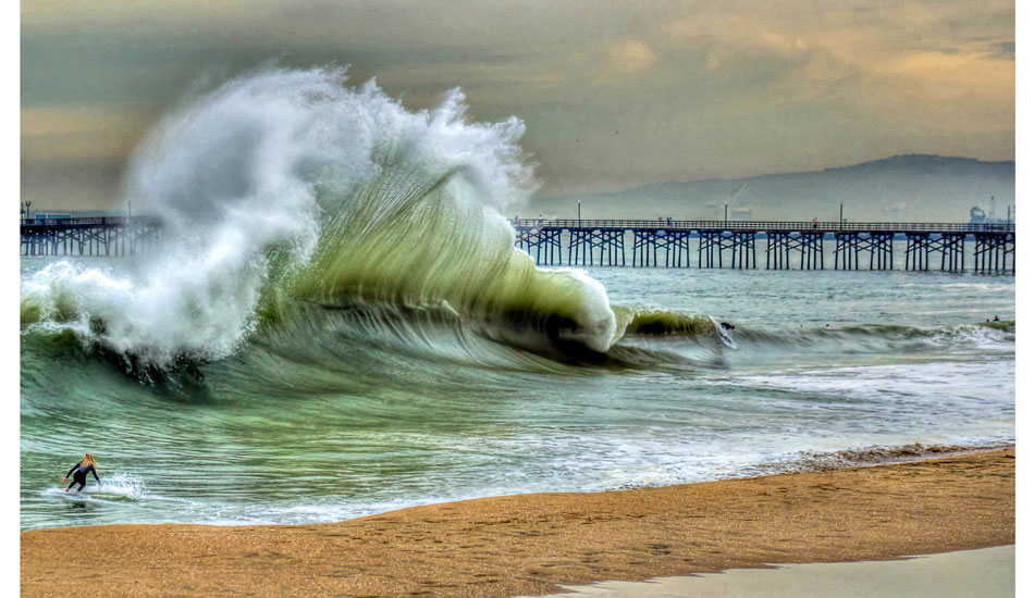 Massive flare at Seal Beach. Austin Keen charging. Photo: <a href=\"http://www.mattadenphotography.com\">Matt Aden</a>