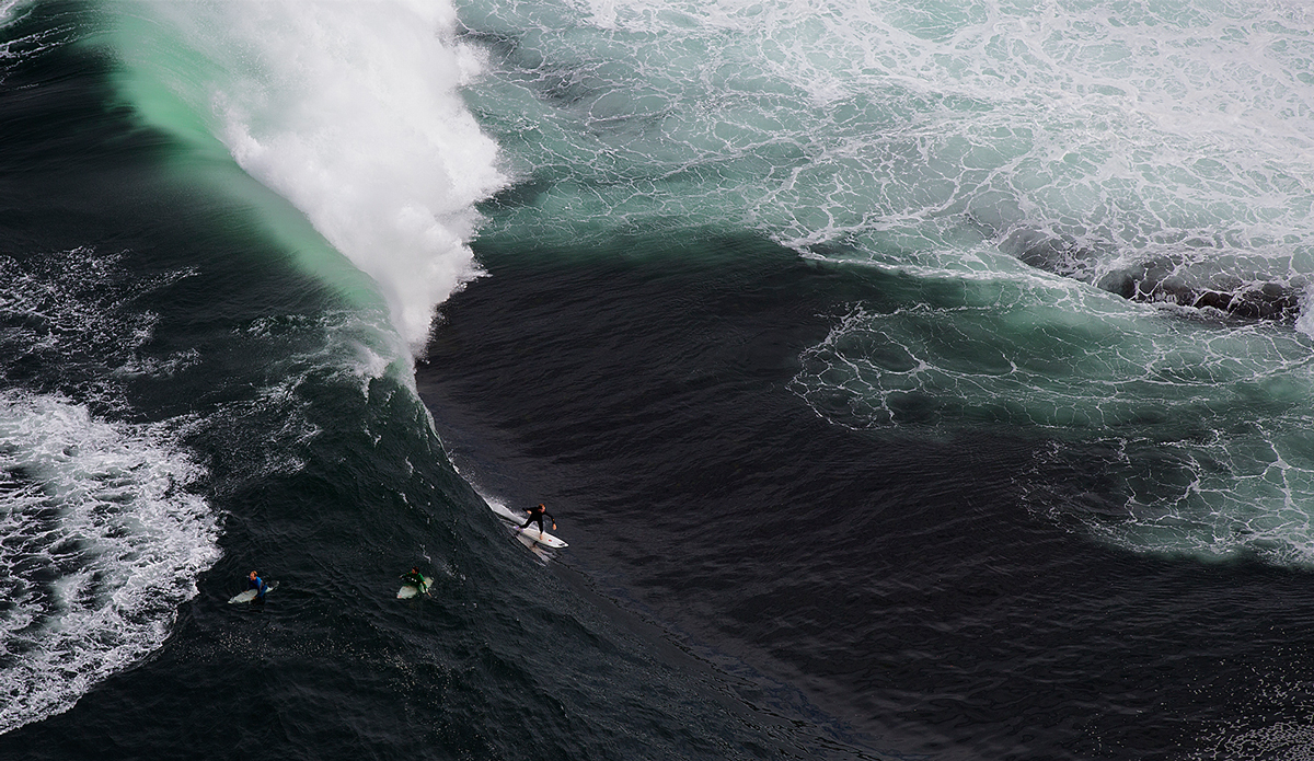 Here is Chris Ross on a bomb, you kind of lose perspective of the size of the wave from the chopper angle, but that is a nugget. Photo: <a href=\"https://www.facebook.com/pages/MattDunbarPhotography/285105918215175\">Matt Dunbar</a> and  <a href=\"http://www.ianbirdphotography.com/\">Ian Bird</a>