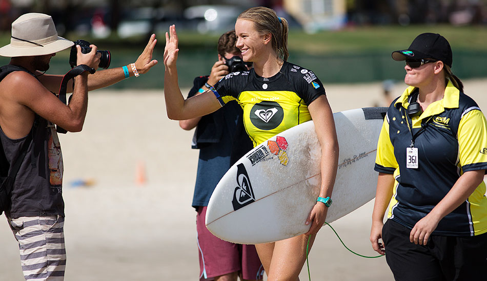 Bianca Buitendag gets a high five after taking down Tyler Wright. Photo: <a href=\"http://mattdunbar.com.au\">Matt Dunbar</a>