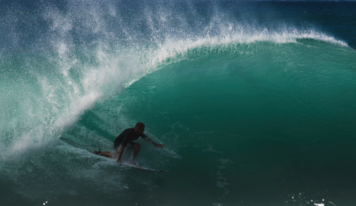 Mick Fanning. Barrel master. Photo: <a href=\"http://www.modelmayhem.com/2752873\">Matt Dunbar</a>