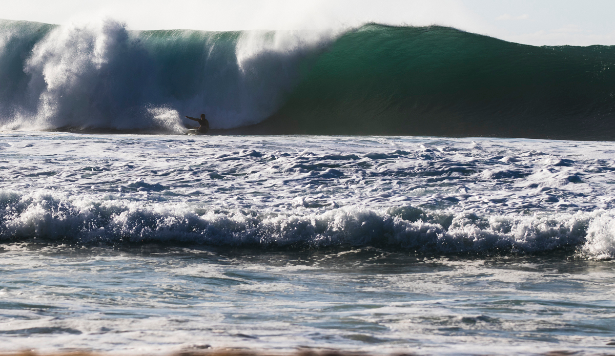 Huge bottom turn. Photo: <a href=\"http://www.modelmayhem.com/2752873\">Matt Dunbar</a>