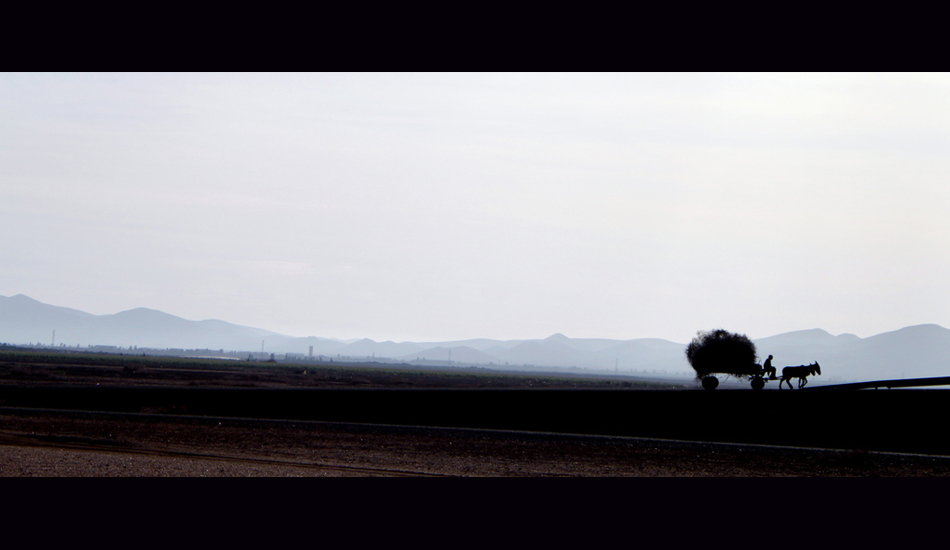 <strong>Morocco.</strong> A Lonely Countryman. We were driving to Casablanca and during the entire trip we were admiring how unique the landscape is. Then this countryman just passed next to us. I like the shapes of the hills and the donkeys. Image: Sbrizzi