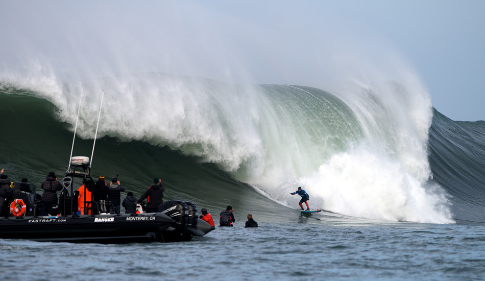 2013 champion Peter Mel outruns a bomb to start off his 2014 Maverick\'s Invitational in Half Moon Bay, California. Photo: <a href=\"http://www.driftwoodfoto.com/\">Benjamin Ginsberg</a>