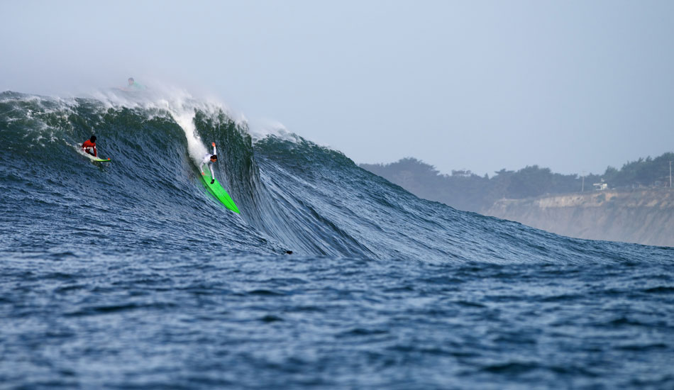 Nic Lamb makes a critical takeoff during his heat at the 2014 Maverick\'s Invitational in Half Moon Bay, California. Photo: <a href=\"http://www.driftwoodfoto.com/\">Benjamin Ginsberg</a>