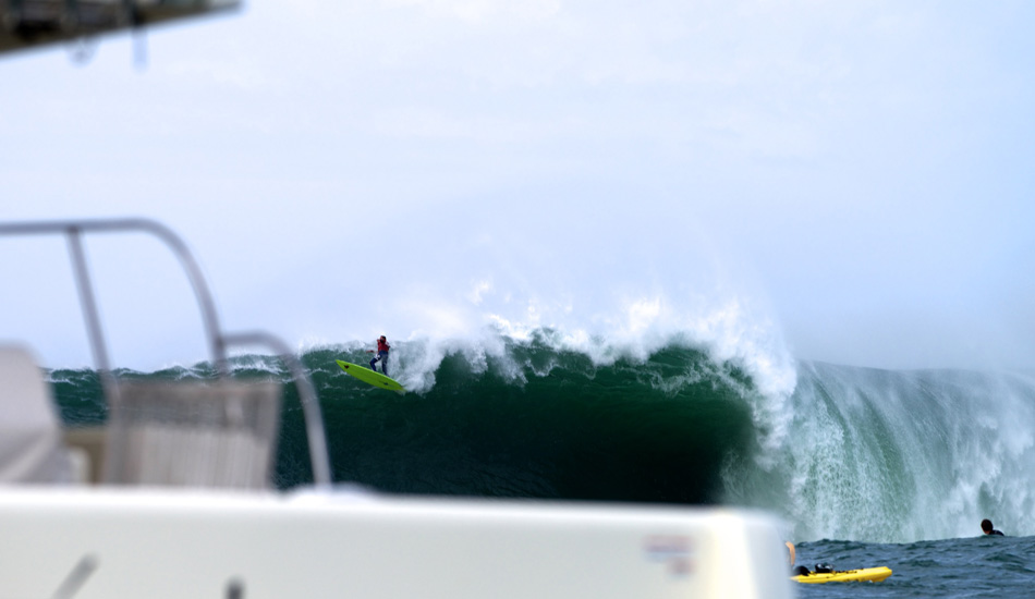 Anthony Tashnick proves local knowledge isn\'t always enough as he get sucked over the falls at the 2014 Maverick\'s Invitational in Half Moon Bay, California. Photo: <a href=\"http://www.driftwoodfoto.com/\">Benjamin Ginsberg</a>