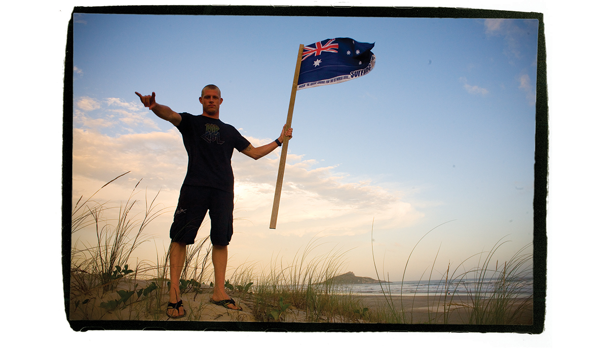 \"His first world title in 2007, and I brought this flag, and I had the idea of him on top of the hill for Australia, like a battle. So he gave me ten minutes and we went across the sand dune in Brazil and we shot that photo, and I thought it really summed it up: Australia taking ground.\" Photo: <a href=\"http://t-sherms.com/\" target=\"_blank\">Steve Sherman</a>