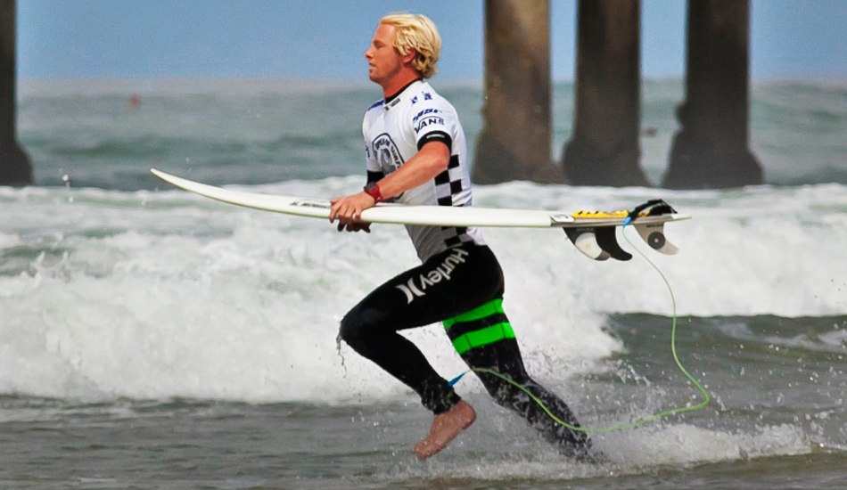 Nat Young on his way to work at the US Open. Photo: <a href=\"https://www.facebook.com/SCsurfshots\">Mike Healey</a>