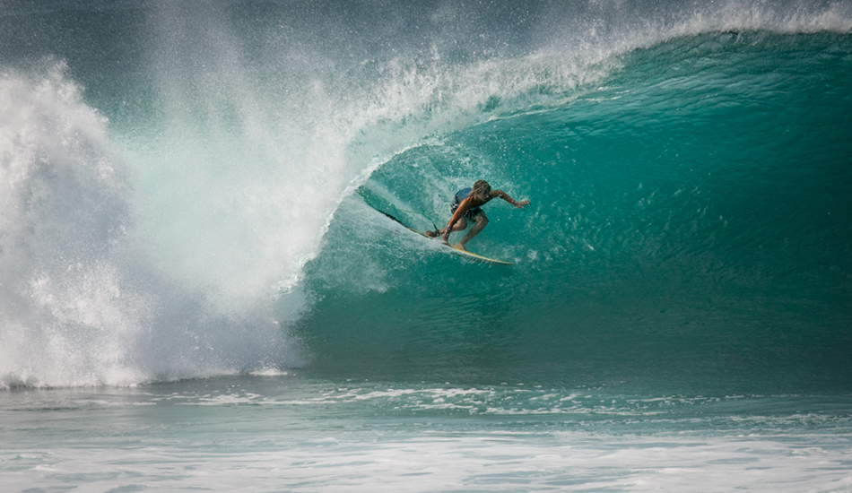 A grom gets one at Pipe. Photo: <a href=\"https://www.facebook.com/SCsurfshots\">Mike Healey</a>