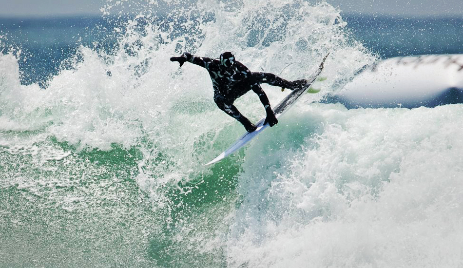 Mr. Wells as the Hurley Phantom jumped off the HB pier and ripped.
 Photo: <a href=\"https://www.facebook.com/SCsurfshots\">Mike Healey</a>