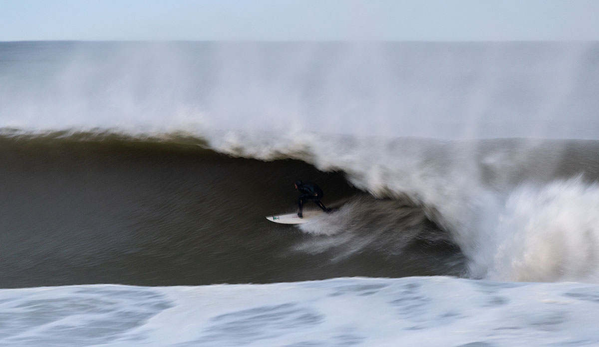 Ryan Huckabee finds cover in a very dark tube. Photo: <a href=\"http://www.patnolanphoto.com\">Pat Nolan</a>