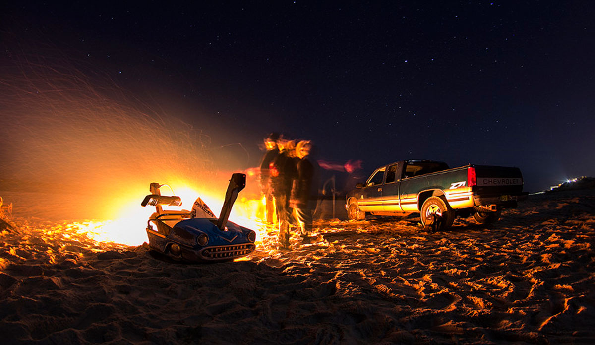 Post Hurricane Sandy Bonfire. Just a couple friends on the beach with a washed up car from a ride on the boardwalk. Photo: <a href=\"http://www.davenilsenphotography.com/\">David Nilsen</a>