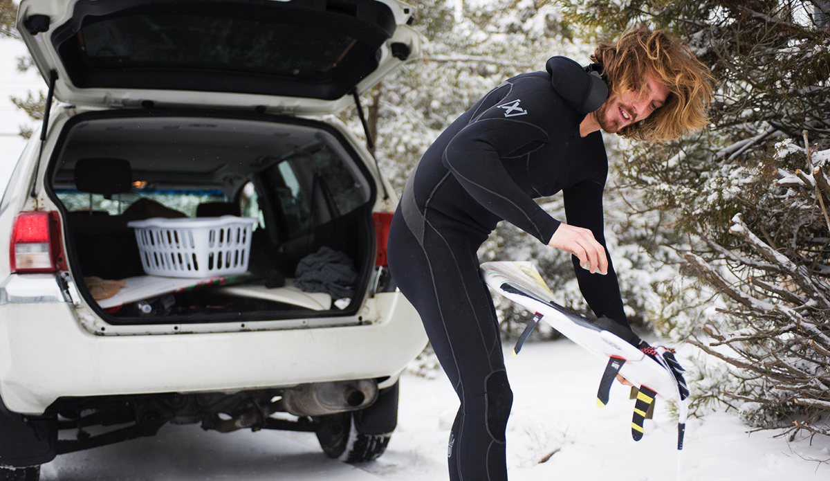 Clay Pollioni waxing up before a cold session. Photo: <a href=\"www.jeremyhallphotography.com\">Jeremy Hall</a>