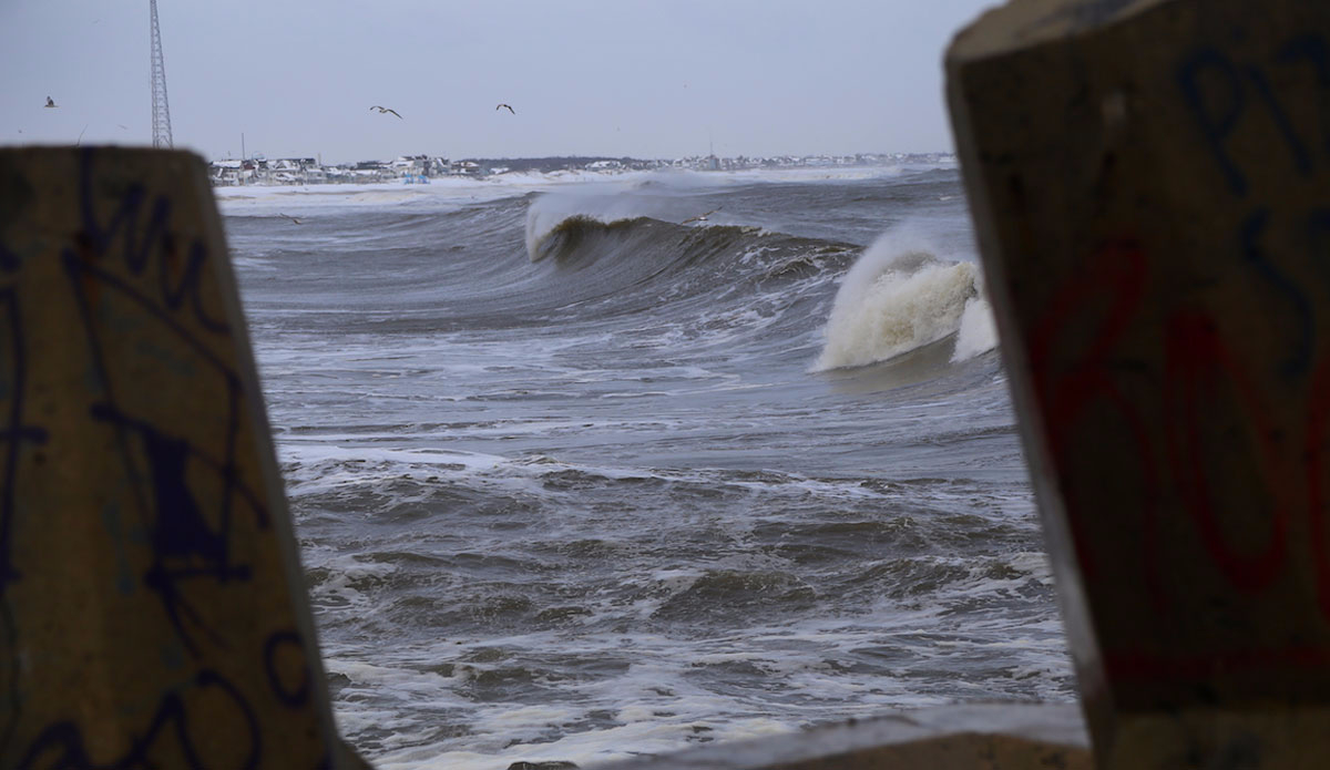 An angry, dirty, and cold post snow-storm swell slams the coast. Photo: <a href=\"http://michaelguccione.smugmug.com/\"> Michael Guccione</a>