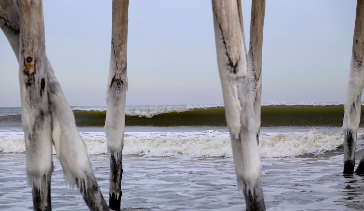 Winter breaks from beneath the frozen pier. Photo: <a href=\"http://michaelguccione.smugmug.com/\"> Michael Guccione</a>