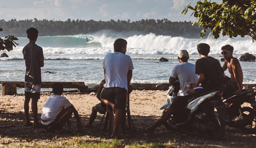 The locals have been very successful in protesting the Government planned roadway that would jut out just past that first line of whitewater, changing the wave and its troubled surf culture forever. Photos: Jenya Ivkov