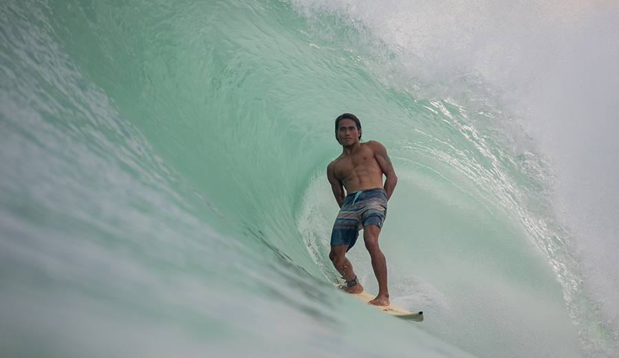 Yoza Zagoto, a local hotshot, strikes a pose. He personifies the intimate relationship the locals share with this extraordinary wave. 