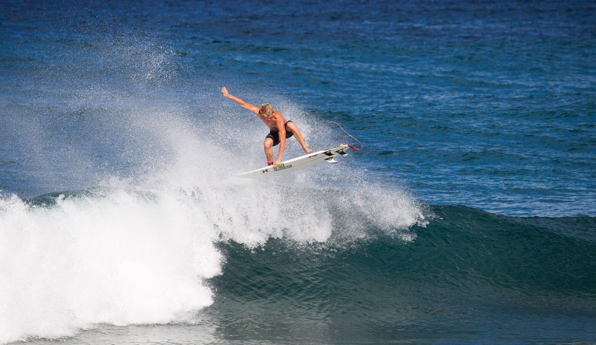 It is a small wave, but look at the board and see if you notice something different...he is doing this switch stance. Photo: <a href= \"http://www.nrhphotos.com/\">Nick Hoermann</a>