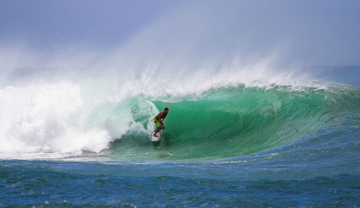 Relaxed style in a not-so-relaxed barrel. Mike Akima. Photo: <a href= \"http://www.nrhphotos.com/\">Nick Hoermann</a>