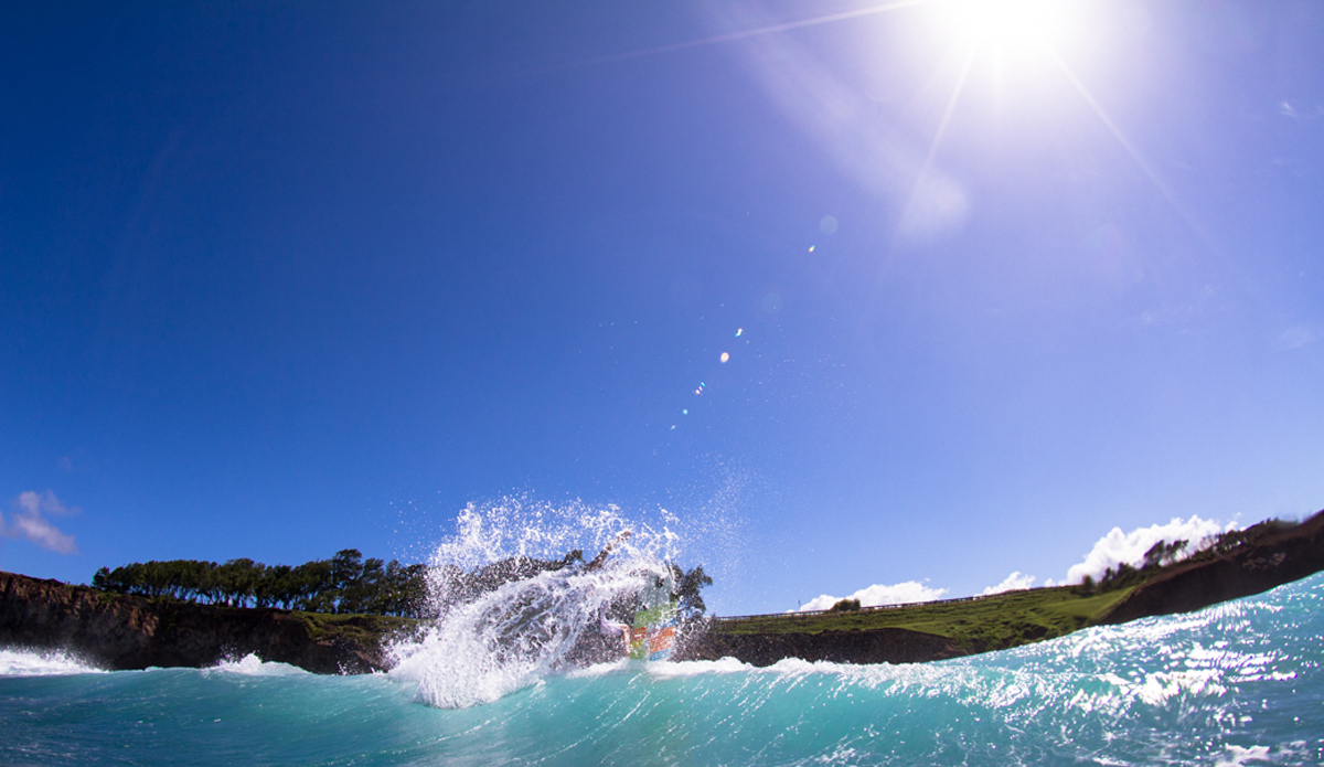 This one’s from my first day in the water, also. I’ve always thought that looking back at the wave from the lineup was a unique angle, so this was my take on it. Photo: <a href=\"http://www.nickricca.com\">Nicks Ricca</a>