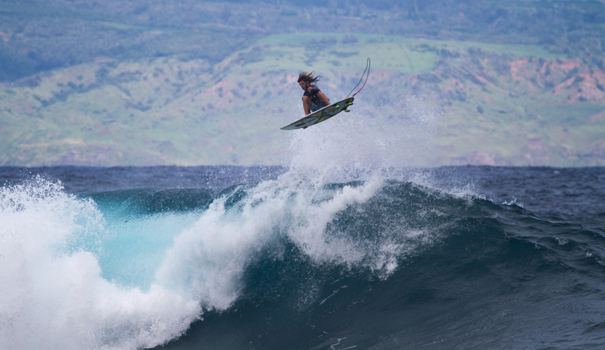 Meola flying high and tight somewhere. After this wave I jumped in and shot in the water to get a different perspective. Photo: <a href=\"http://www.nickricca.com\">Nicks Ricca</a>