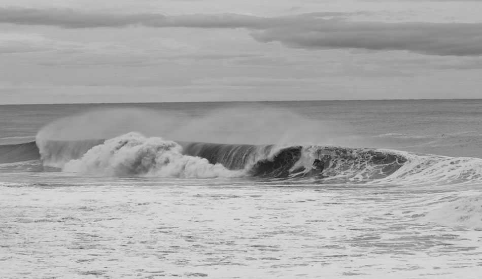 Unknown Surfer on a bomb. Photo: <a href=\"http://www.flickr.com/photos/patnolan\" target=_blank>Pat Nolan</a>