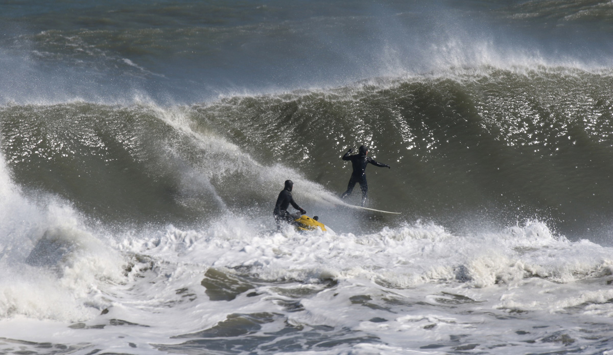 Nicely placed by the ski, Dana Quinn takes on a smoker. Hatteras Island, North Carolina. Photo: Mickey McCarthy