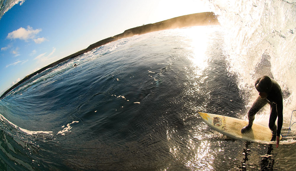 Chris Clarke is an electrician, he moved to Scotland with his talented artist wife in search of a way of life near good waves. He found it, and loves to ride left barrels, so much so he shaped this board in his kitchen specifically for this wave. Image: <a href=\"http://www.timnunn.co.uk\" target=\"_blank\">Nunn</a>