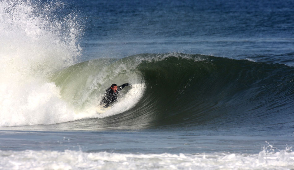 Drew Meredith-An avid ski assist surfer, Drew Meredith decided to do it manually today, squeezing one out on this Mirlo left.  Photo: Mickey McCarthy.