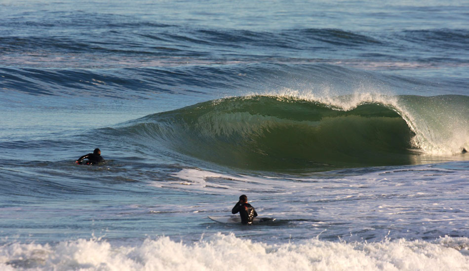 Kitty Hawk Wave-Between the hurricane and several strong nor\'easters, all the sand bars have been re-arranged in town for the better. The sand is packed in nice and close to shore, which helps create this little Kitty Hawk snapper.  Photo: Mickey McCarthy.