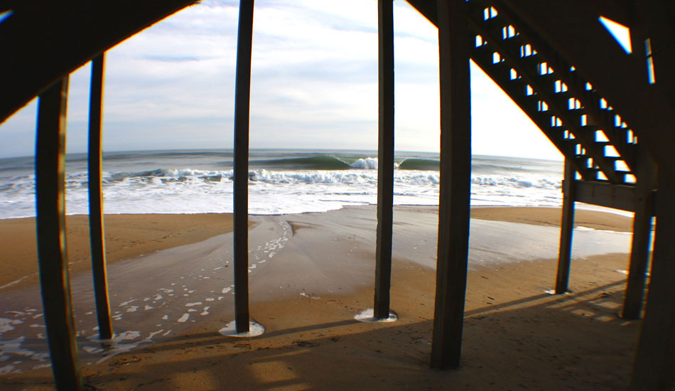 Under the House-In town fights the same erosion problems as our neighbors do farther south, just not quite as extreme. Kitty Hawk always seems to get the worst of the over wash, and I\'m afraid it doesn\'t look too good for these houses along the Beach road, Hwy 12.  Photo: Mickey McCarthy.