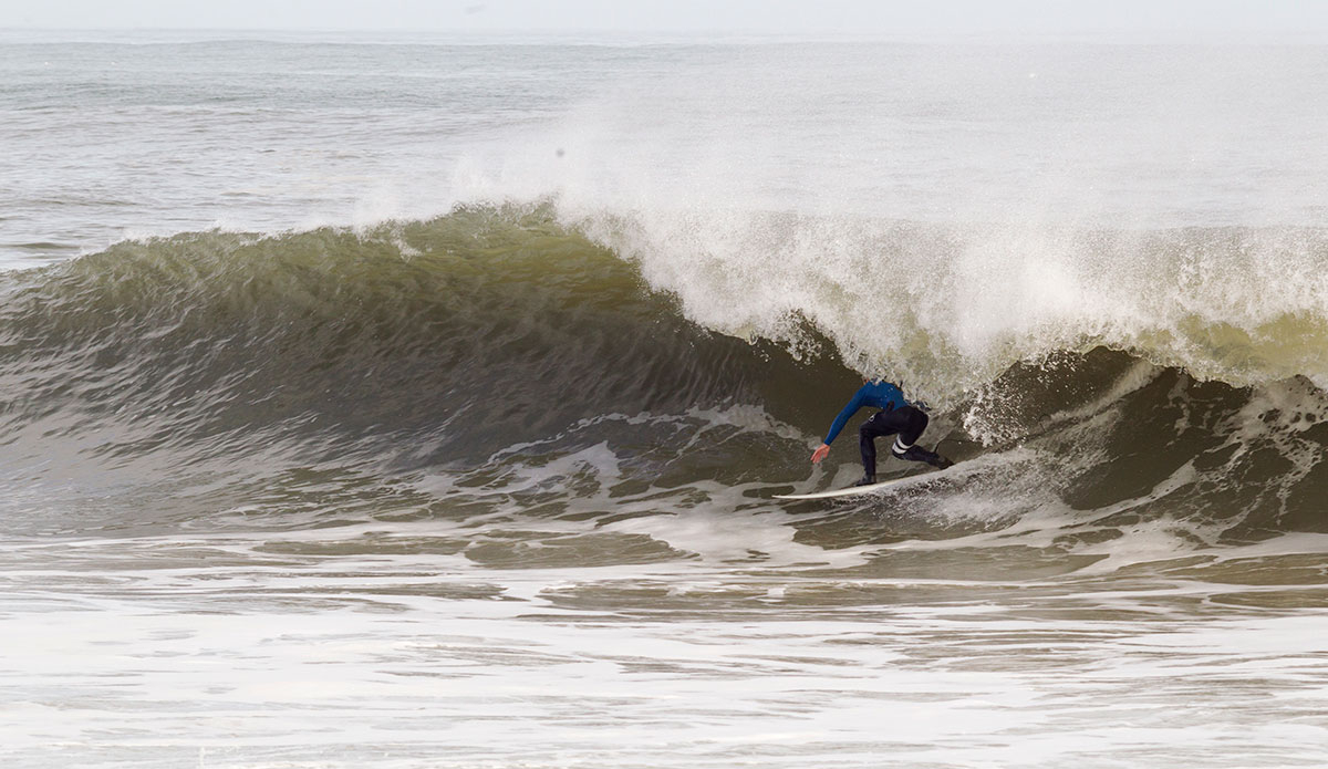 Noah Snyder setting up for a long and deep barrel. Photo: Bob Hovey