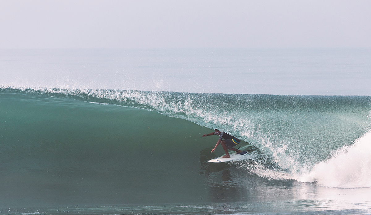 Pacific coast madness. One of the local riders doing what they do best, charging ahead with a smile on their face. Photo: <a href=\"http://www.kheperphoto.com/\">Paola Núñez Linares</a>