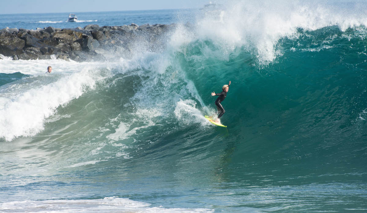 Newport’s own Sage Burke catching one of the bigger waves of the afternoon. Photo: <a href=\"https://www.flickr.com/photos/patnolan\">Pat Nolan</a>