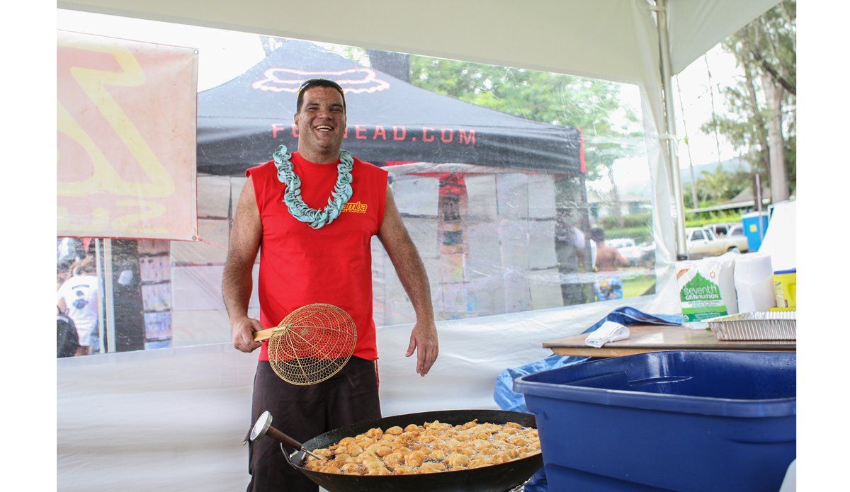 Tamba provided true local spirit and sugar buzz for the event. Here he perfects the art of “Malasadas.” Photo: <a href=\"http://www.danegrady.com/\">Dane Grady</a>