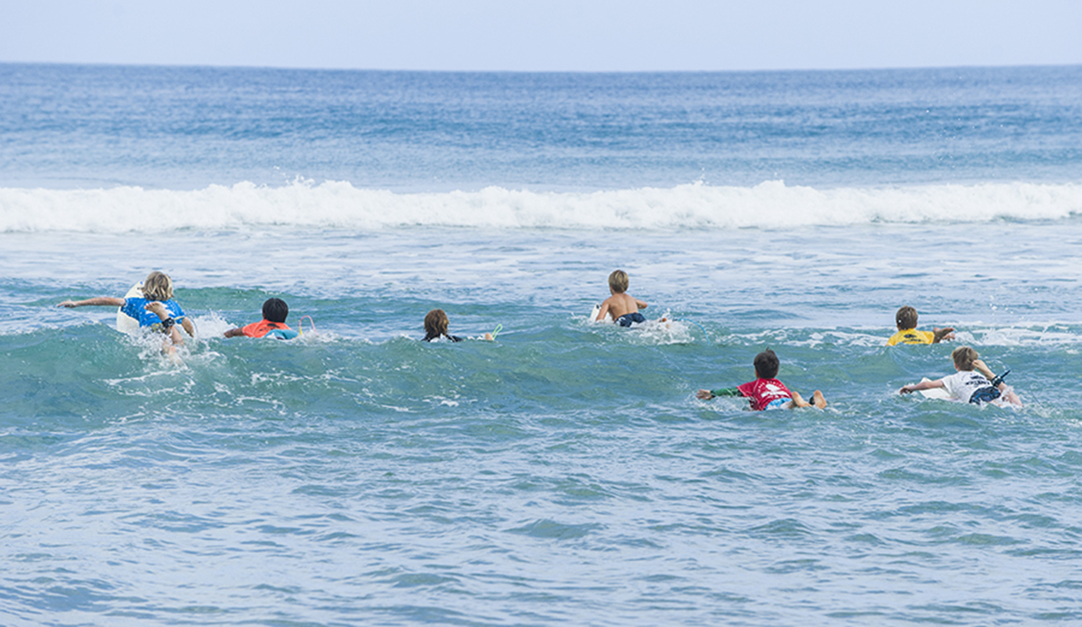 Boys ages nine and ten last heat paddle out.