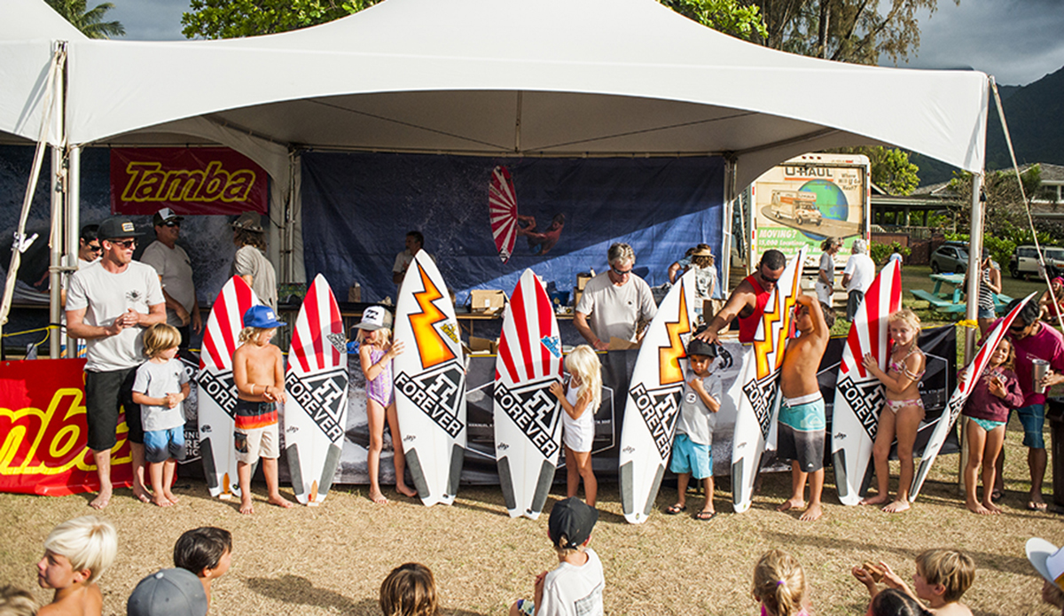 Tamba Surf Company doing the surfboard give away to some lucky groms.