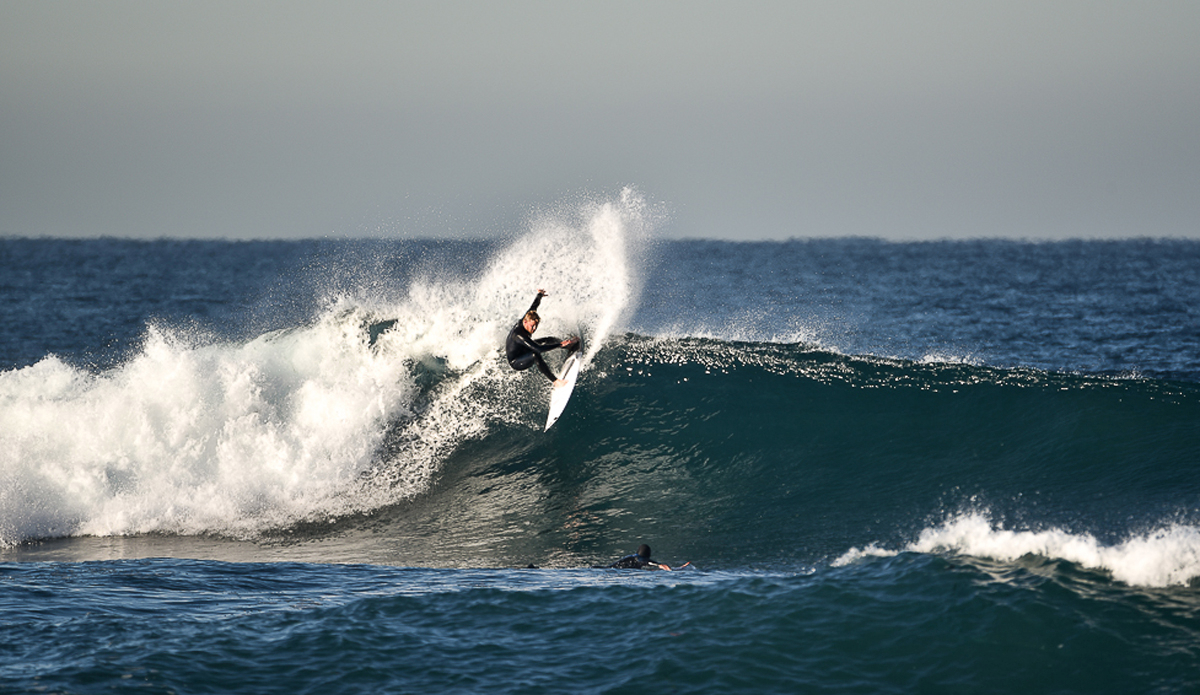 Hunter Lysaught a true humanitarian.  Here he is with a big clean hack off the reef. Photo: Michael Bonwell