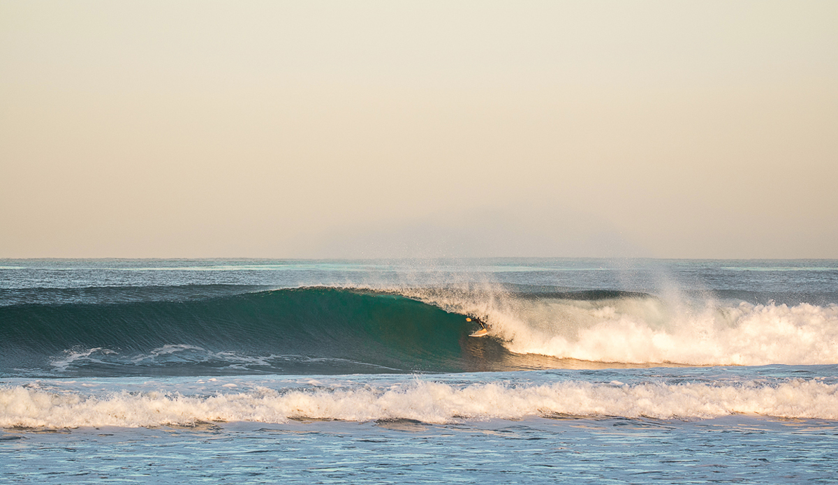 Michael Zambetti has style in and out of the water.  He\'s also one of the best tube riders around here. Photo: Michael Bonwell